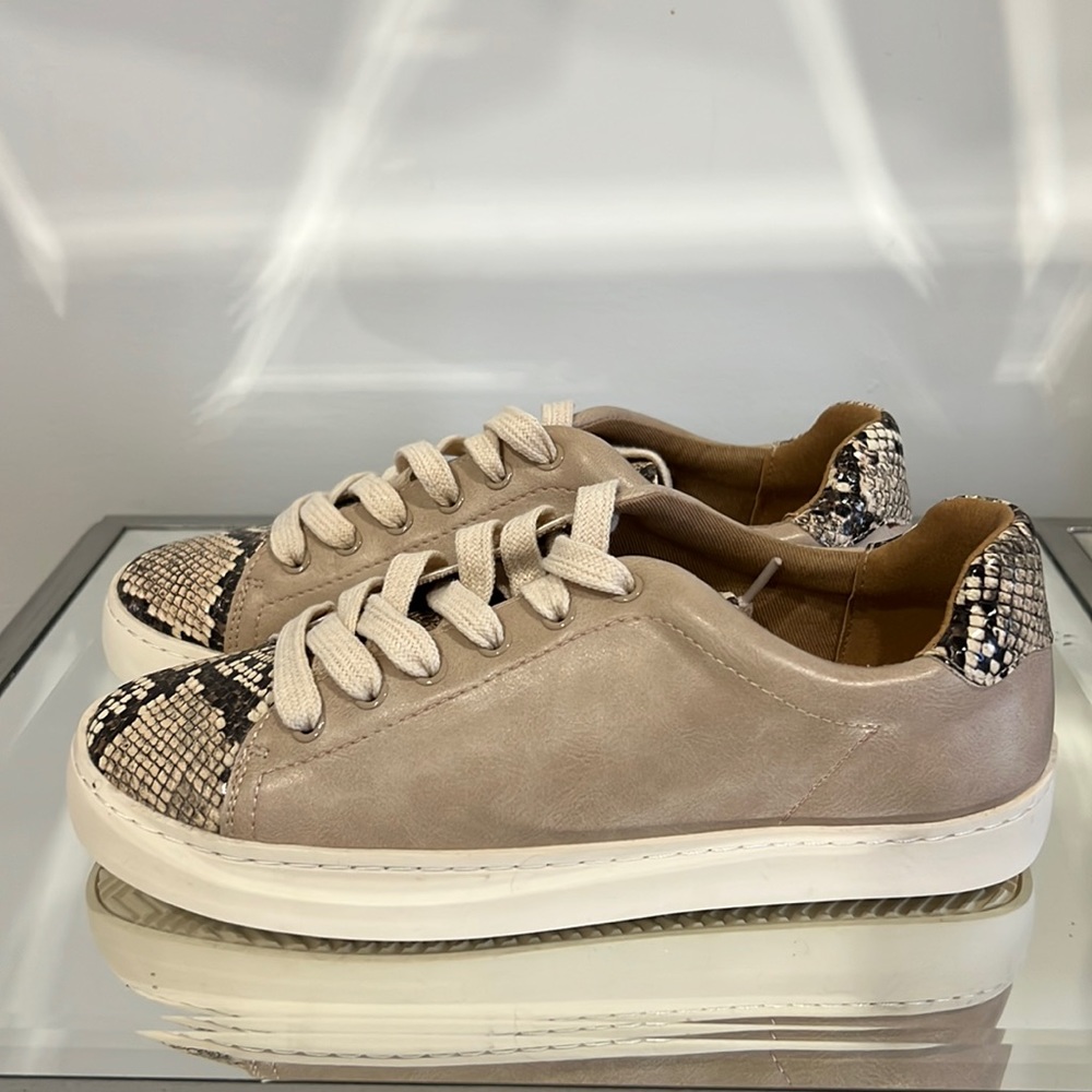 Tan and snake skin runners